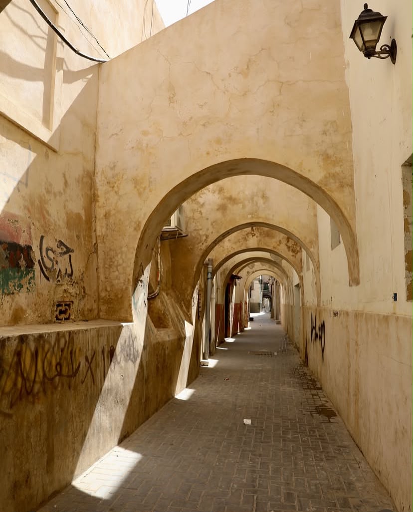 A historic arched passageway in Libya